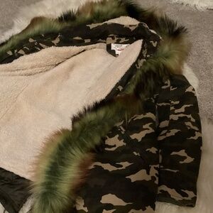 Multi layer cold weather camo jacket.